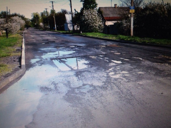 За махинации с ремонтом Полтавской чиновнику грозит 8 лет тюрьмы, а подрядчику - 12